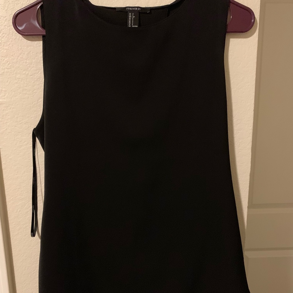 Black top with slit on back